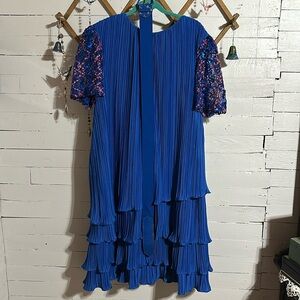 Beautiful vintage blue dress with sequin arms and original stretch belt!